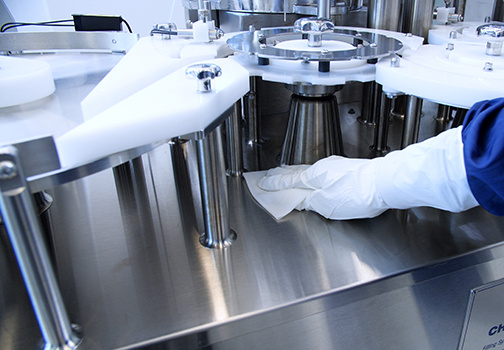 Using Contec Cleanroom Wipes on stainless steel equipment.